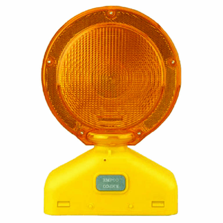orange construction flashing light for baricades and drums