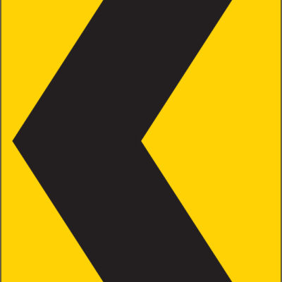 chevron turn this way yellow sign