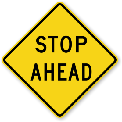 stop ahead yellow safety sign