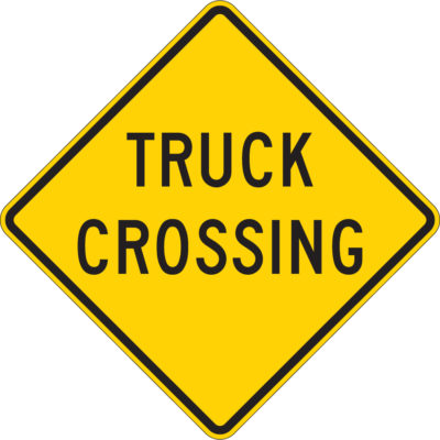 truck crossing diamond yellow sign
