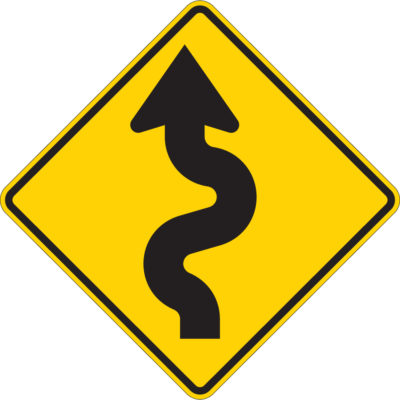 winding road yellow sign
