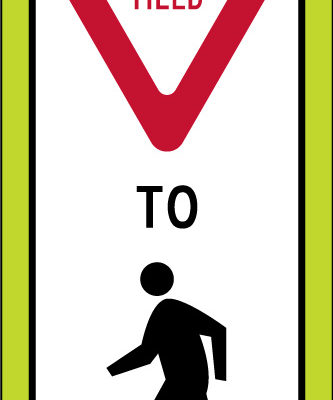 state law panel yield pedestrians yellow sign