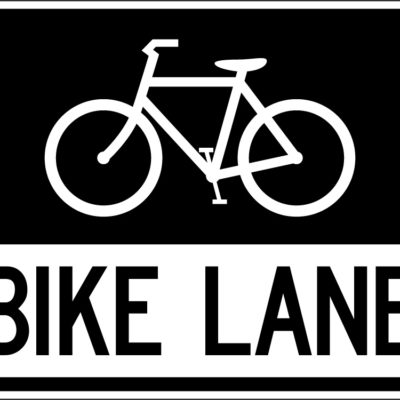 bike lane white sign