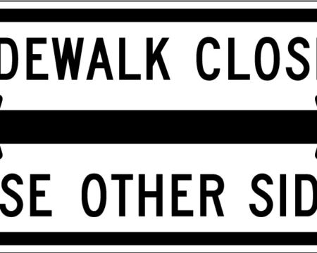 sidewalk closed use other side both side arrows white sign