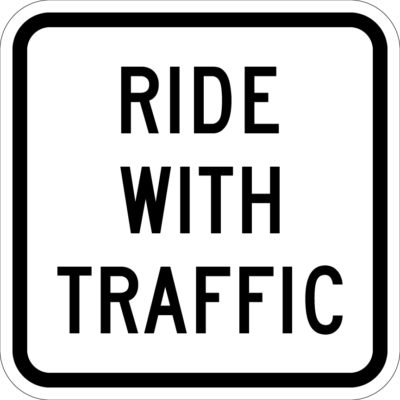 ride with traffic white sign