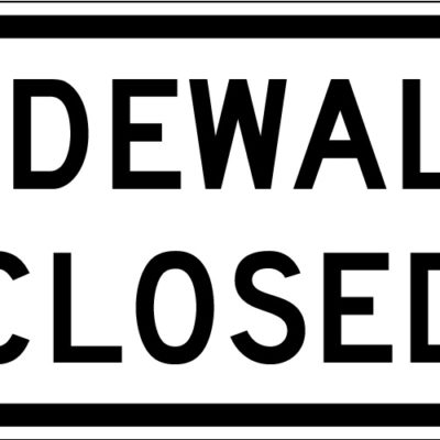 white sidewalk closed sign