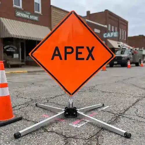A visual comparison diagram contrasting an old, non-compliant traffic sign with a new, MUTCD 11th Edition compliant retroreflective sign from Eastern Metal Signs and Safety, updated for 2026 worksite standards.