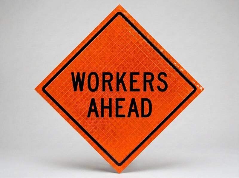 Roll-up work zone signs in reflective and non-reflective materials